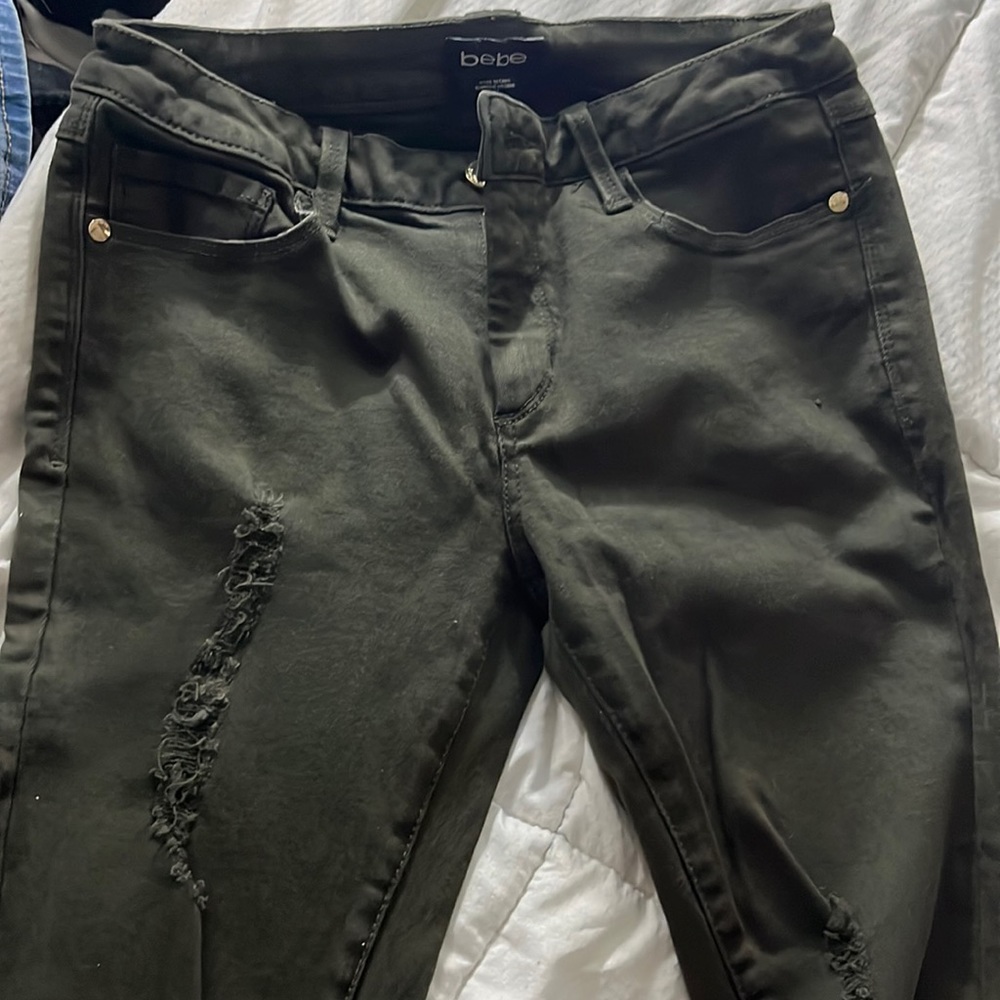 Woman’s green jeans